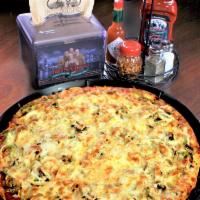 Fabulous Four Pizza · Gourmet Italian sausage, mushrooms, onions and green pepper.