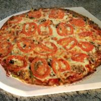 The Veggie Pizza · Mushroom, onion, green pepper with tomato on top.