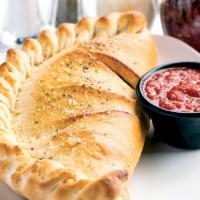 Cheese Calzone · Add up to 4 pizza Ingredients for additional charge.