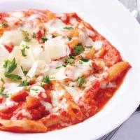 Three Cheese Baked Penne · A hearty pasta dish smothered in our homemade marinara sauce then baked with nctotta. Mozzar...