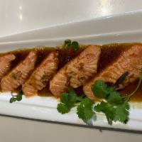 Salmon Carpaccio · Sear Scottish salmon with fried onion in wasabi yuzu.