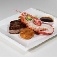 Surf and Turf · Grilled beef tenderloin and half Maine lobster, crispy mashed potato and au jus port wine re...