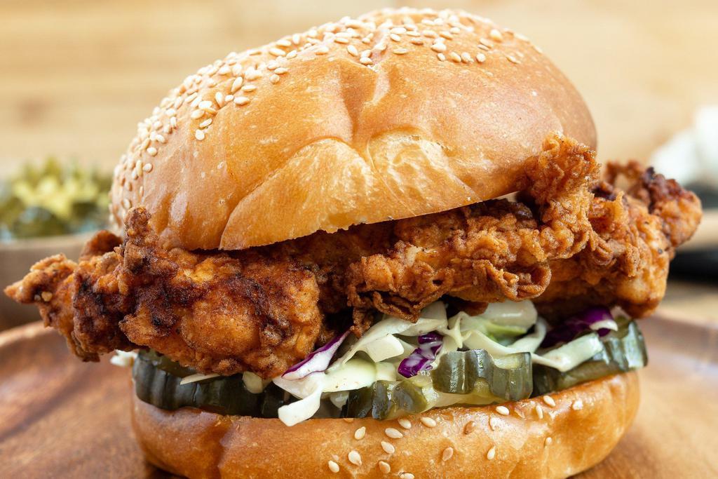 Frick’n Chick’n Sandwich · Our signature Southern fried chicken sandwich served with creamy coleslaw and housemade bread and butter pickles on a grand central bun.