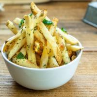 Garlic Herb Fries · Crispy natural cut fries tossed in fresh herbs and garlic oil. Served with side of garlic ai...