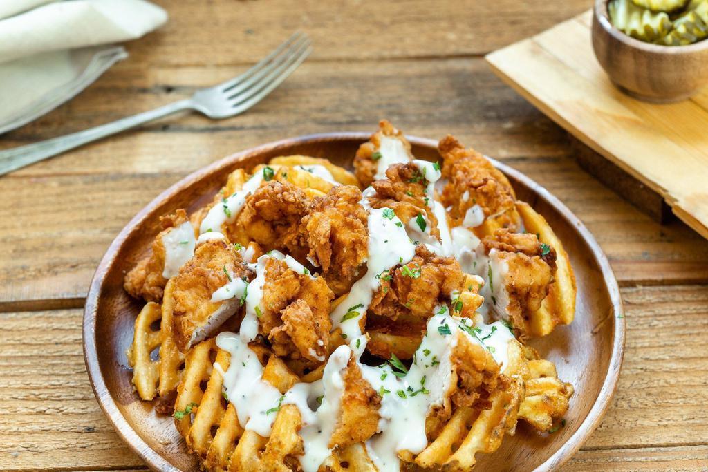 Chicken ＆ Waffle Fries · Waffle fries topped with pieces of crispy chicken and country gravy. (Gravy is served on the side)