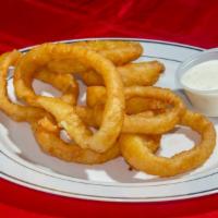 Onion Rings · 8 pieces. Served with ranch sauce.