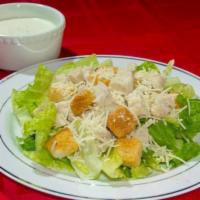 Chicken Caesar Salad · Lettuce, chicken breast, caesar dressing croutons and parmesan cheese.