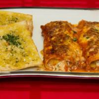 Manicotti Florentine · Vegetarian. Fresh tube pasta stuffed with spinach and blended cheeses, baked in marinara sau...