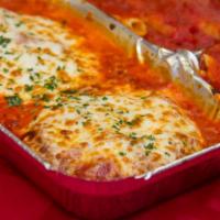 Eggplant Parmigiana · Layers of Eggplant, baked in marinara sauce, top with melted mozzarella cheese.