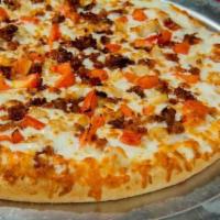 Chicken Bacon Ranch Pizza · Ranch sauce, chicken, bacon, tomatoes and provolone cheese.