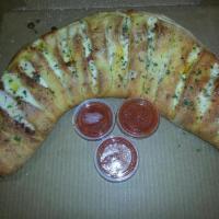 Chicken Bacon Ranch Calzone · Ranch sauce, chicken breast, bacon, tomatoes and provolone cheese.