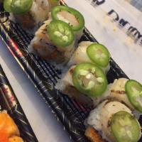 Oppa Roll · spicy scallop and crunch inside, aburi style sea scallop on top with jalapeno.