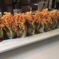 Dancing Crab Roll · prawn tempura inside with cucumber, topped with a sheet of avocado, and spicy imitation crab...