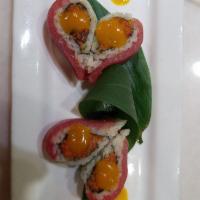Tuna Lover Roll · spicy tuna and tempura flake inside. big eye tuna on top with spicy mango sauce.
