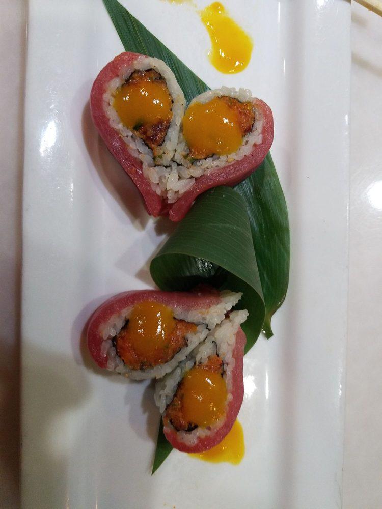 Tuna Lover Roll · spicy tuna and tempura flake inside. big eye tuna on top with spicy mango sauce.
