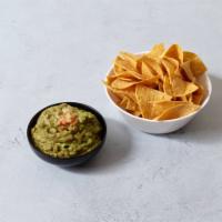 2. Guacamole · With onions, cilantro and chile. Served with warm chips. 
