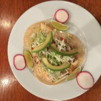 Fish Tacos · Three soft corn tortillas topped with cabbage, pico de gallo, avocado and creamy chipotle sa...