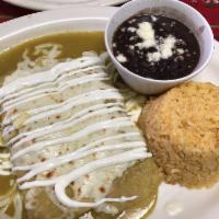  Chicken Enchilada · two chicken enchiladas topped with green salsa and melted cheese,sour cream.rice and black b...