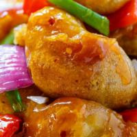 Sweet & sour Chicken  · comes with white rice 