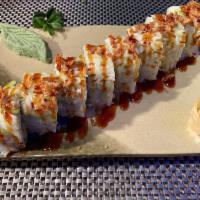 Virginia Beach Roll  · On top cooked cabbage deep fried onion eel sauce.
Inside tempura salmon, cucmber,avocado ins...