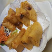6. Vegetable Egg Rolls · Deep fried egg rolls skin stuffed with vegetables, served with sweet and sour sauce.