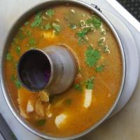 17. Spicy Soup · Spicy and sour soup with your choice of meat, mushroom, lemongrass, galangal, kaffir lime le...