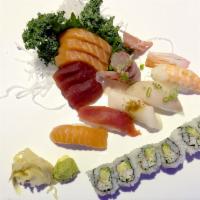 Sushi and Sashimi Combo · 5 pieces of assortment sushi, 10 pieces of sashimi and 1 California.  Includes soup or salad.