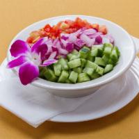 Shirazi Salad · Combination of fresh chopped cucumbers, tomatoes, parsley, onions with virgin olive oil and ...