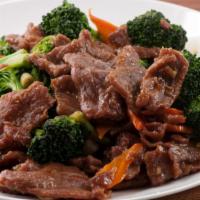 Broccoli Beef · Tender beef strips with broccoli, carrots, and onions stir fried in brown sauce. 