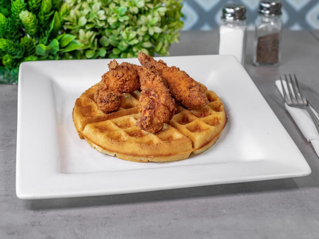 Chicken and Waffles · Redbird farms buttermilk fried chicken breast and whole wing, Belgian waffle, gravy, syrup, or honey.