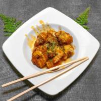 A4. Slap Happy Shrimp · 8 pieces of panko-breaded fried shrimp. Topped with a sweet tangy sauce and sesame seeds.