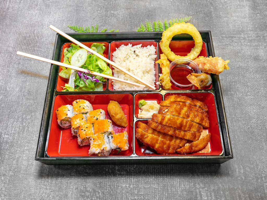 B12. Don Katsu Bento Box · Breaded and deep fried pork cutlet.