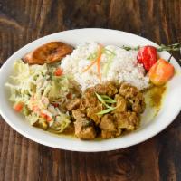 Curried Goat · Served with choice of 2 sides.