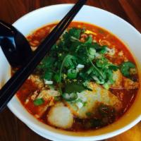 61. Tom Yum Noodle Soup · Minced pork, sliced pork, pork balls, bean sprout, chili paste and ground peanuts in a chili...