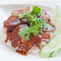 116. Moo Dang  · Roasted pork, Chinese sausage, layered with the chef's secret gravy sauce. Add boiled egg or...
