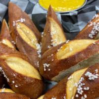 Pretzel Poppers · pretzel bites, drizzled honey, house-made beer mustard 