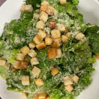 Caesar · romaine lettuce, garlic croutons, shaved parmesan, house-made caesar dressing, anchovies 