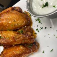 Bone-In Wings · 6 bone-in wings with your choice of sauce