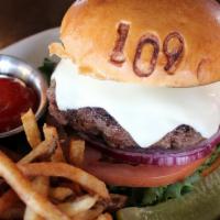 American Burger · half pound beef burger, american cheese, lettuce, tomato, onion, brioche