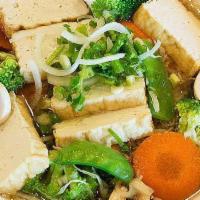 B16. Phở Fried Tofu & Vegetables Noodle Soup - Phở Chay Tàu Hủ & Rau Cải · Fried-Tofu, broccoli, Carrot, Peas & Cabbage with choice of broth (Veggie / Chicken or Beef ...