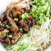 D2. Grilled Pork Vermicelli Noodle ( Bún Thịt Nướng ) · Served with lettuce, fresh bean sprouts, cilantro, cucumber, pickled daikon, carrot and roas...