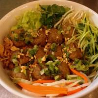 D6. Grilled Ground Pork Meat-Ball & Vermicelli Noodle - Bún Nem Nướng · Skewers with vermicelli noodle. Served with lettuce, fresh bean sprouts, cilantro, cucumber,...