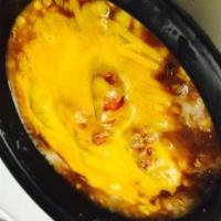 Mashed Potato Bowl Dinner · Boneless buffalo wings, over mashed potatoes, corn, bacon, melted cheese, & gravy.