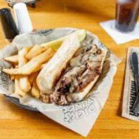 Philly Cheese Sandwich · Melt-in-your-mouth Philly steak or chicken smothered with grilled peppers, onions and mushro...
