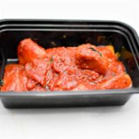 Vindaloo · Cooked with potatoes in tangy sauce.