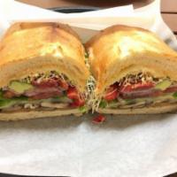 Veggie-Licious Sandwich · Eggplant, mushrooms, avocado, roasted peppers, alfalfa sprouts, provolone and cheddar cheese...