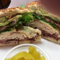 Risky Bizness Sandwich · Hot pastrami brisket, crab salad, bacon, avocado, pepper jack cheese, pepperoncinis, Lou's s...