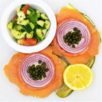 Lox Plate  · Toasted bagel with cream cheese, tomato, cucumber, onion, capers, lox, and lemon. 