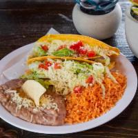 #4 Daily Special · Two Beef Hard shell Tacos Served with rice and beans.