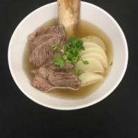 16. Beef Stew in Clear Broth · Savory light broth with noodles. 